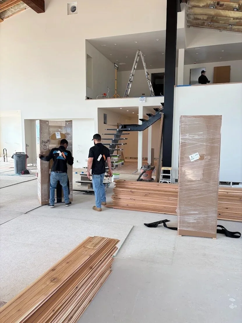 Move Forward LLC crew handling appliance moving, done without a scratched floor in the Inland Northwest